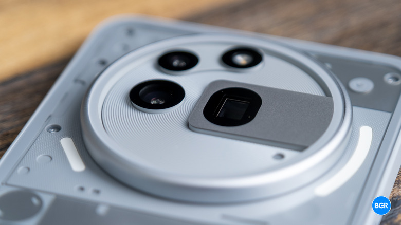 Macro close-up of the Nothing Phone (3a) Pro's triple camera system.