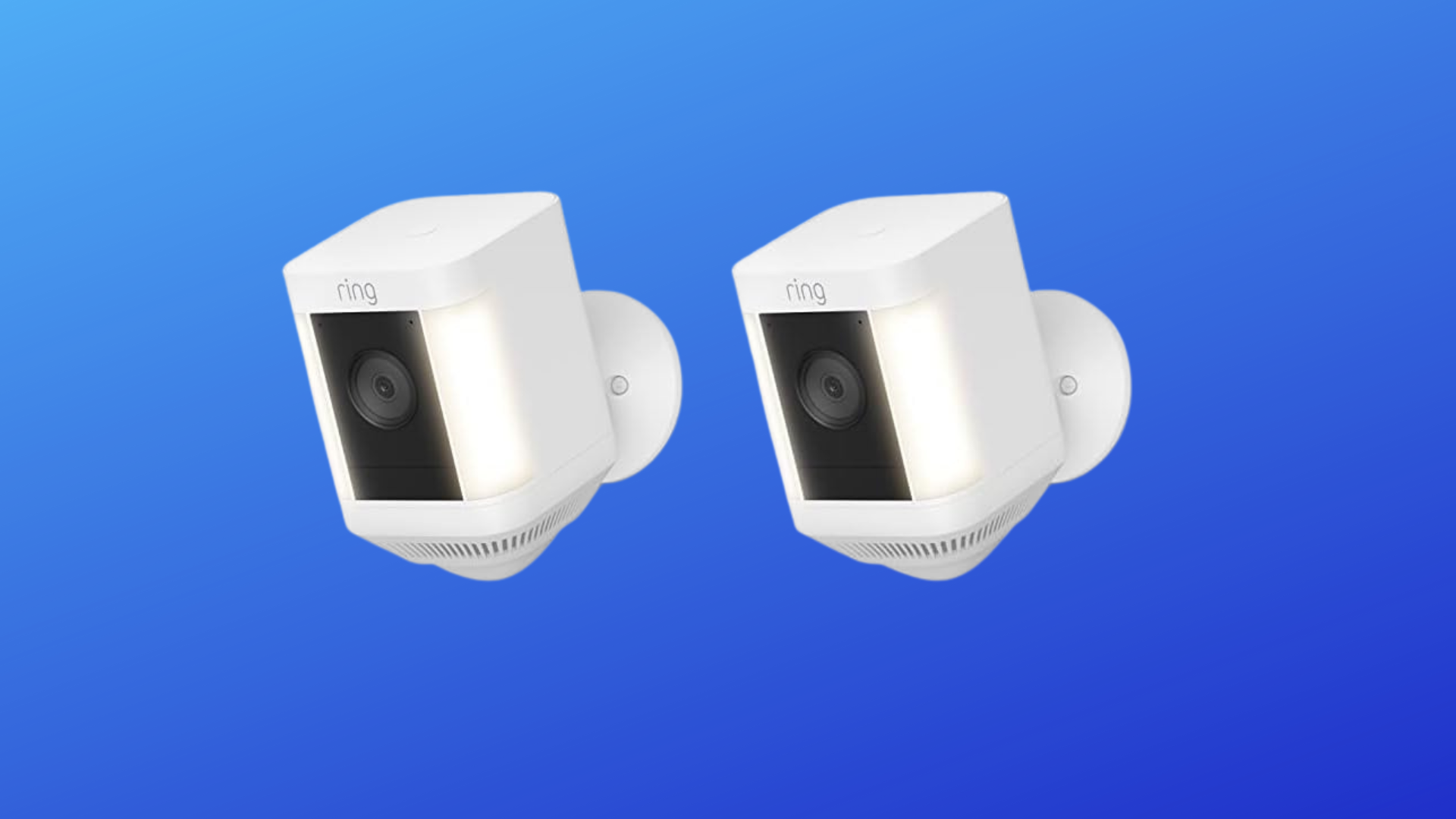 Close-up view of a Ring Spotlight security camera highlighting the lens and the motion sensor area.