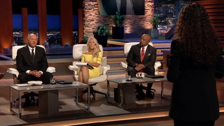 Kevin O'Leary and Lori Greiner during a business pitch segment on Shark Tank.