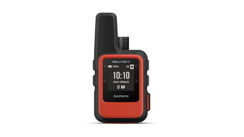 A Garmin inReach Mini 2 satellite communicator held in a hand