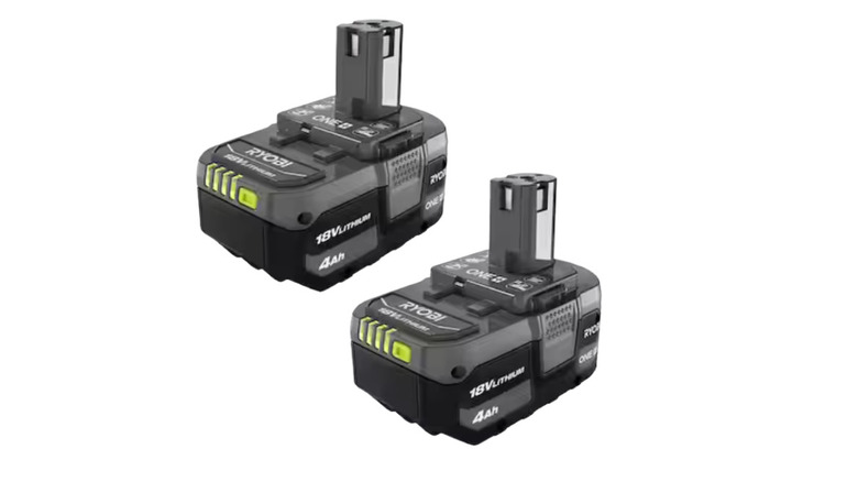 A close-up of a Ryobi One+ 18V lithium-ion battery showing the brand logo and connector.