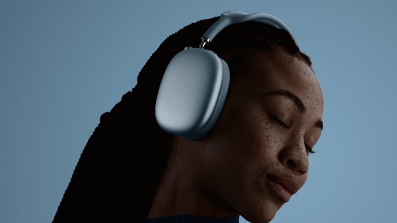 A person wearing AirPods Max 2, demonstrating their common use as a lifestyle and workout accessory.