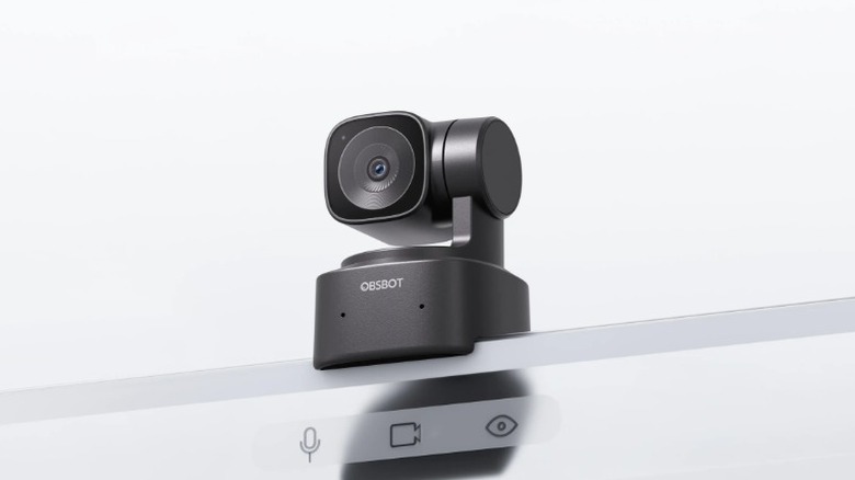 The Obsbot Tiny SE webcam with its mechanical gimbal mounted on a monitor.