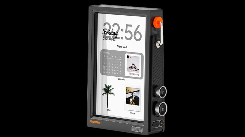 A Divoom Timesframe digital display showing the time, date, and a calendar on a desk.