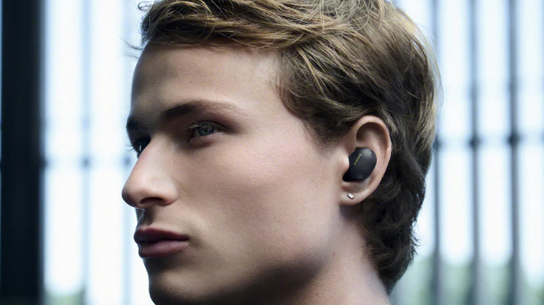 Side profile of the Sony WF-1000XM6 earbuds showing the ergonomic fit against the ear.