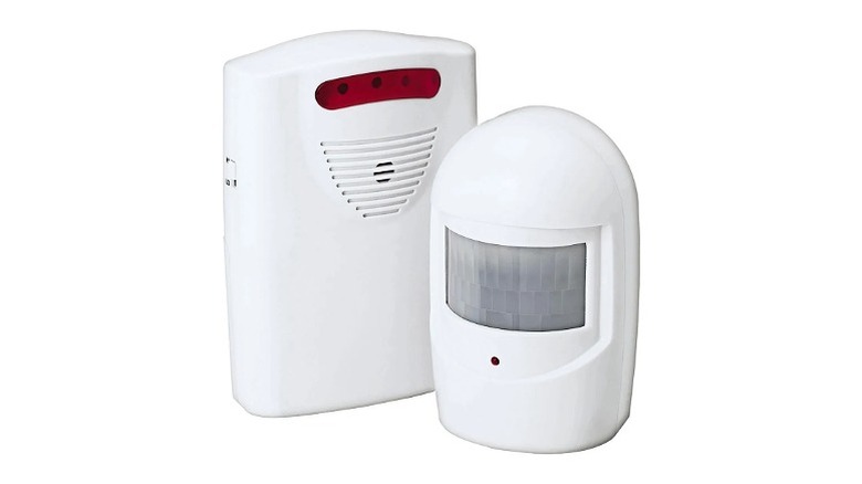 White Bunker Hill wireless motion sensors and receiver unit.