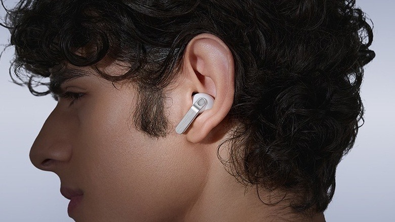 Close-up of a person wearing the Samsung Galaxy Buds 4 Pro earbuds