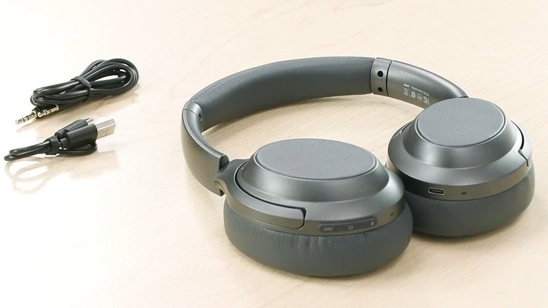 Monoprice BT-600ANC Over-Ear Headphones surrounded by audio cables.