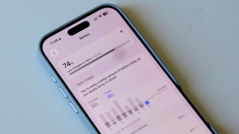 A screenshot of the iOS 26 battery settings menu comparing daily power usage data.