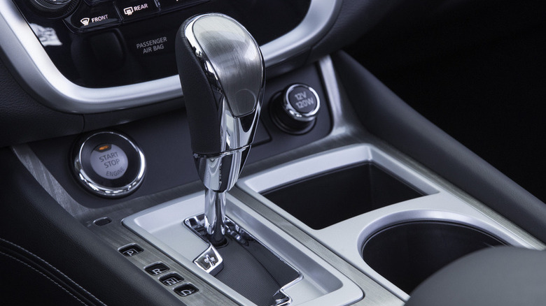 Nissan Murano interior showing the gear shift lever and center console.