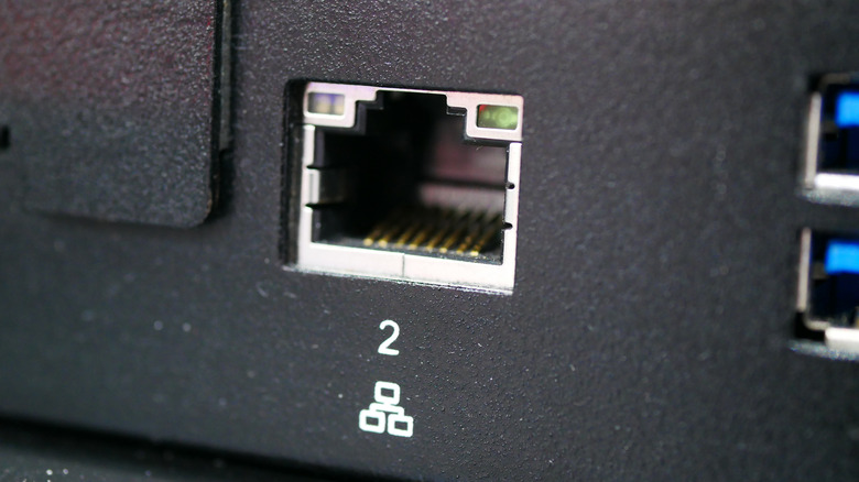 A close-up shot of an RJ45 Ethernet port on the back of a device.