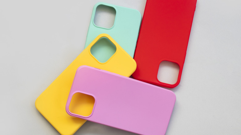 A pile of colorful teal, purple, red, and yellow silicone smartphone cases.