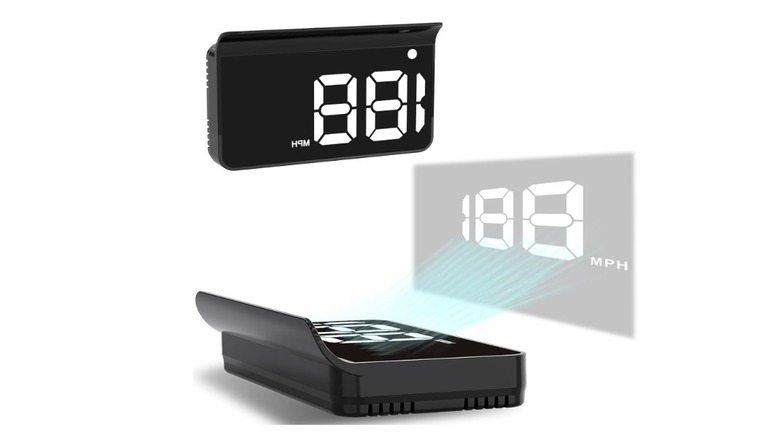 A digital heads-up display projecting vehicle speed in MPH onto a car's windshield.