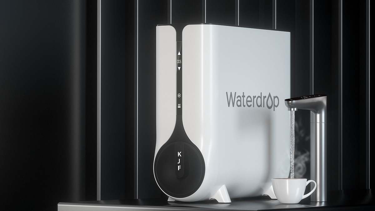 Close-up of a Waterdrop tankless under-sink water filtration system showing its slim profile.