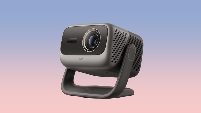 The JMGO N3 Ultimate projector showcased against a minimalist gradient backdrop.