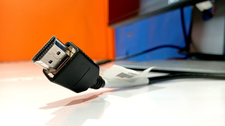 Close up view of the pins and casing of a standard HDMI connector.