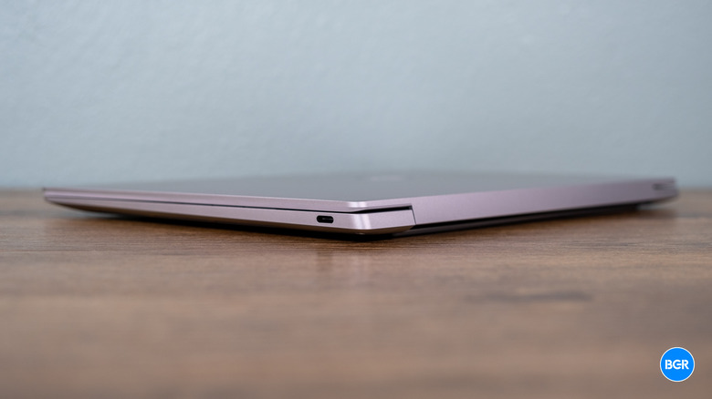 Side profile view of the closed Dell XPS 13 9350 highlighting its slim CNC aluminum chassis.