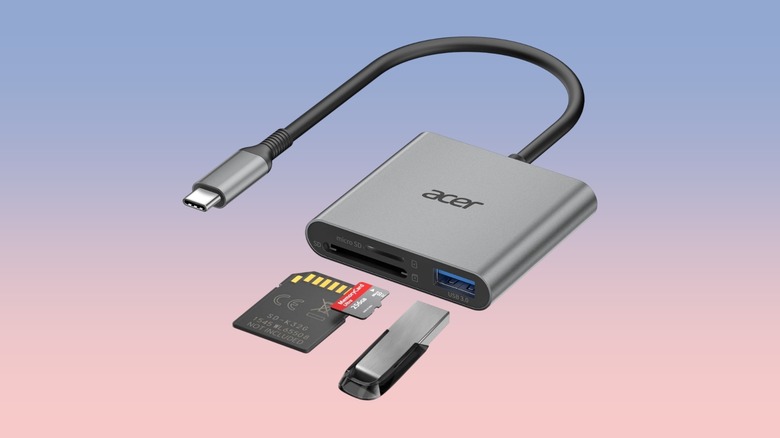 A white Acer 3-in-1 USB-C card reader showing its compact design and card slots.