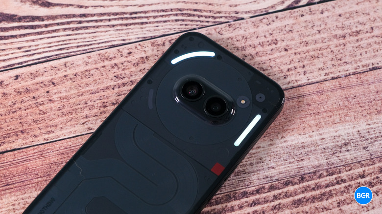 The back of the Nothing Phone 2a showing the illuminated Glyph Interface LED strips.