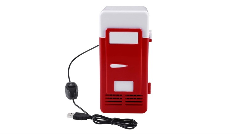 A small red and white TOPINCN mini USB fridge designed for portable beverage cooling.