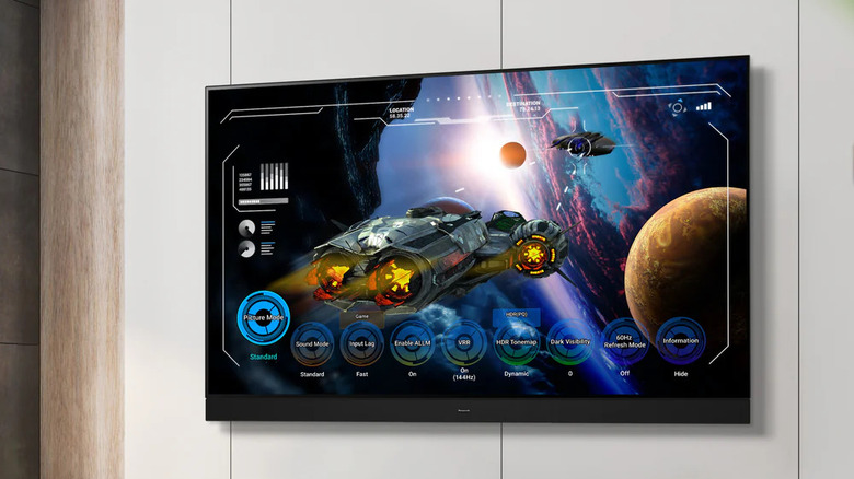A wall-mounted Panasonic Z95B running a high-fidelity video game.