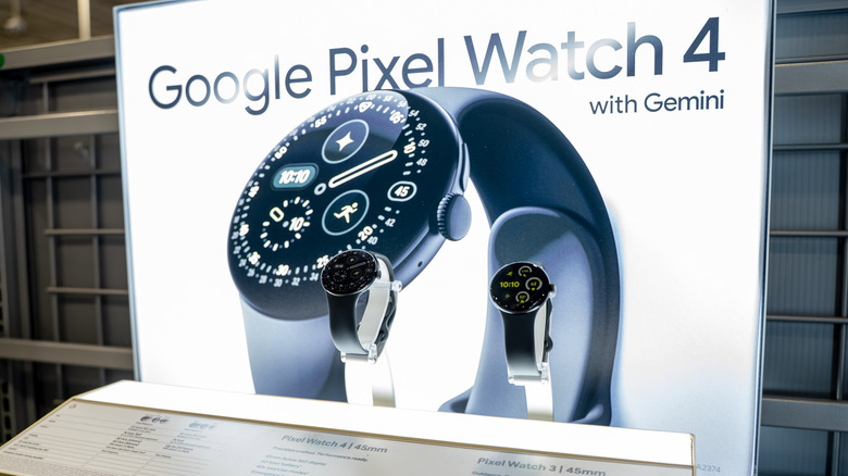 A Google Pixel Watch 4 retail display showcasing the 45mm band option in a store setting.