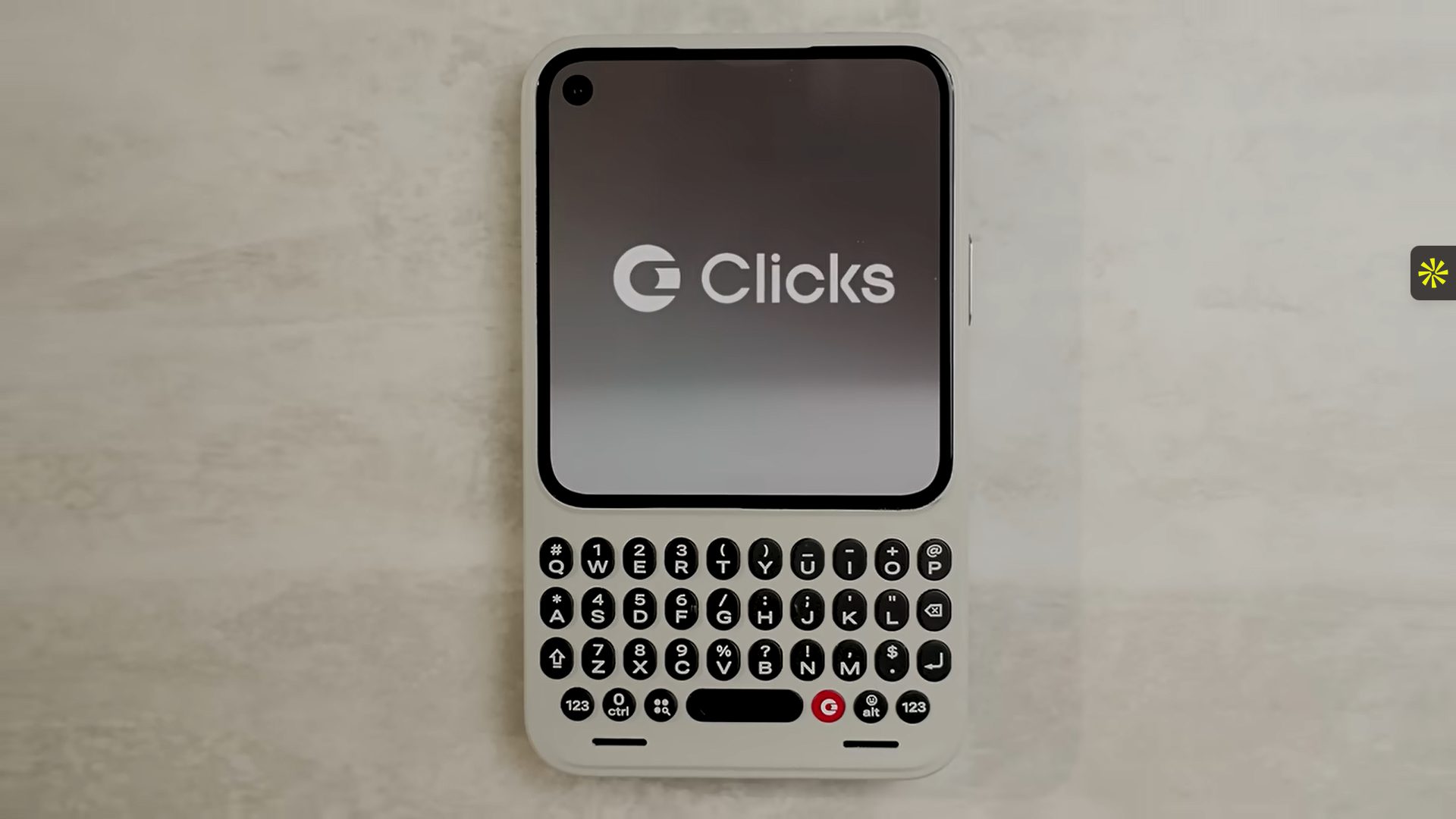 Front view of the Clicks Communicator with a minimalist Niagara Launcher interface.