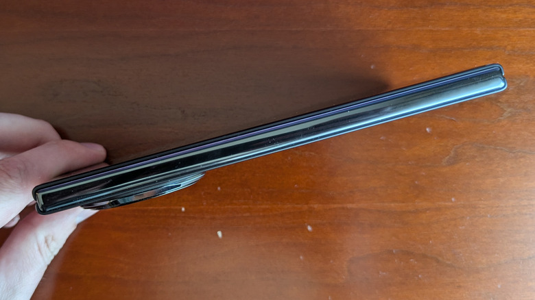 Side profile of the Honor Magic V3 showing its 9.2mm folded thickness.