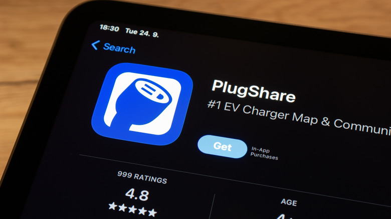 The PlugShare app interface in the App Store, showcasing its utility for finding EV charging stations.