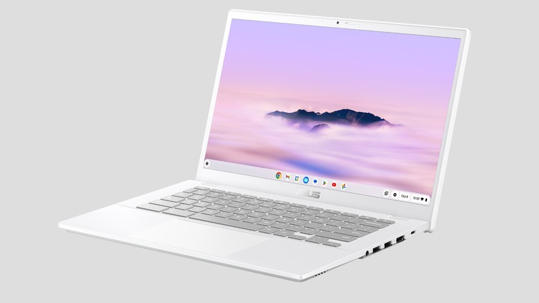A professional product shot of the silver Asus Chromebook Plus CX34.