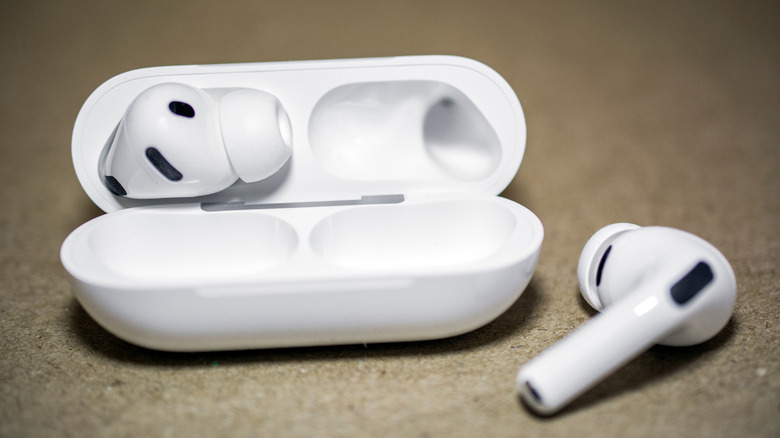 The Apple AirPods Pro 3 earbuds and their charging case.