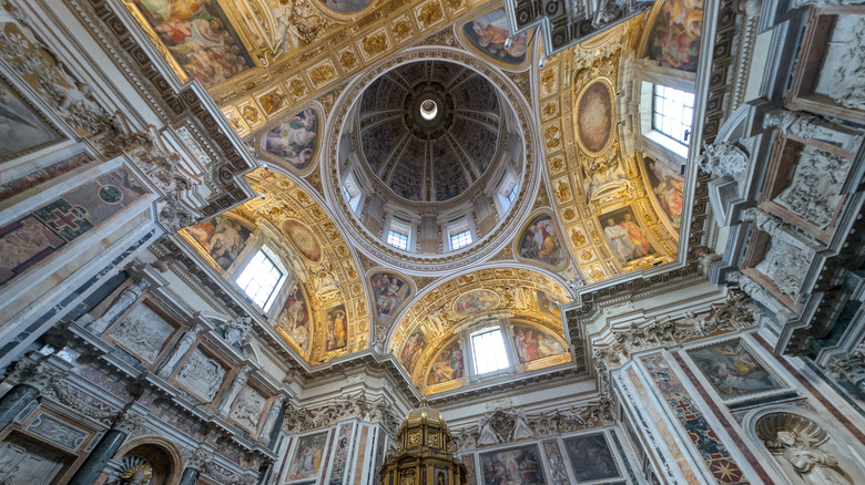 Close-up detail of Michelangelo's frescoes on the ceiling of the Sistine Chapel.