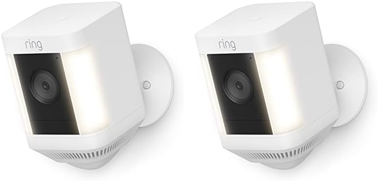 A promotional graphic showing two Ring Spotlight Cam Plus units with a callout for $100 in savings.