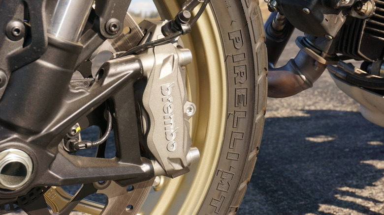 Close-up of the Brembo front brake caliper and disc on the 2025 Ducati Scrambler.