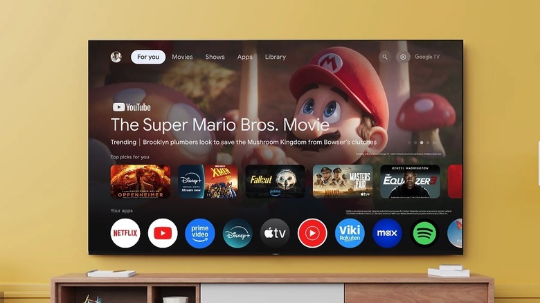 Sony Bravia 8 II OLED TV mounted on a wall showing its Google TV home screen.