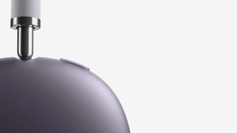 Close-up of the AirPods Max 2 ear cup highlighting the acoustic mesh and aluminum finish.