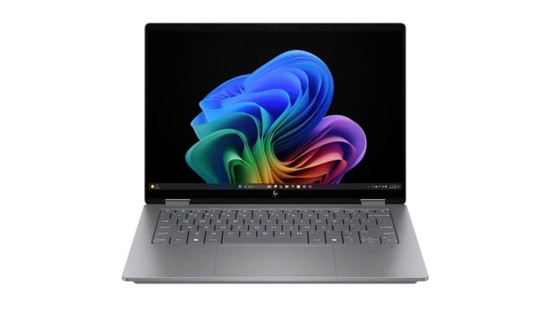 The HP OmniBook X in grey with unique curved lower edges for a comfortable grip.
