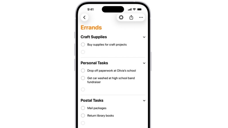 The iPhone Reminders app interface showing items automatically sorted into categories like produce and dairy.