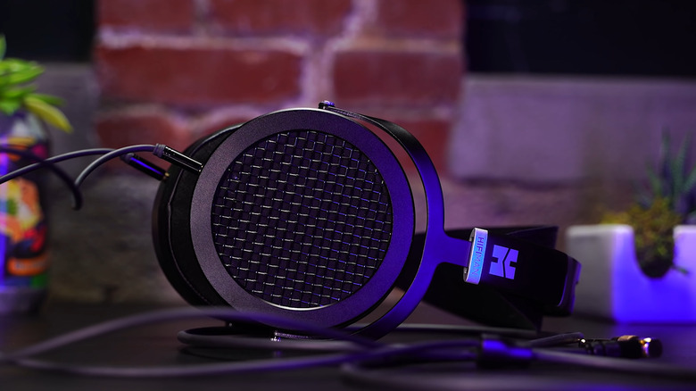 A close-up of a pair of HiFiMan open-back headphones.