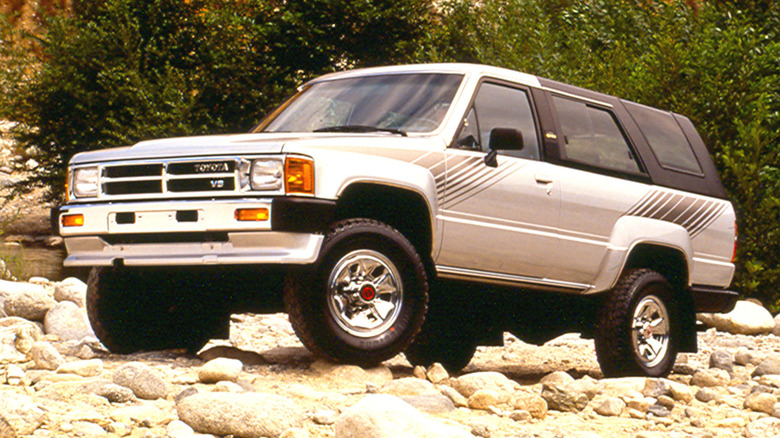 A red 1988 Toyota 4Runner SR5 with its signature white removable rear top