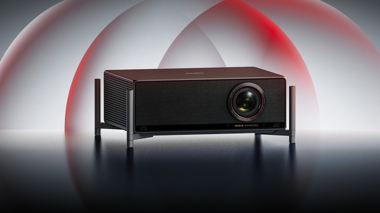 The Xgimi Titan projector with a circular graphic background emphasizing its lens and sensor array.