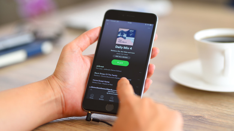 The Spotify app page shown on the mobile App Store interface.